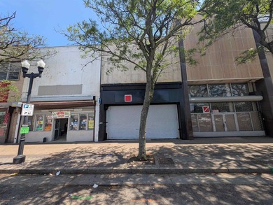 Prime retail location with 25 feet of street frontage along - photo 3