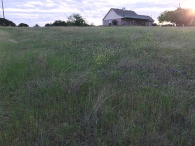 Quarter acre lot which has been cleared is located in 24-7 gated - photo 8