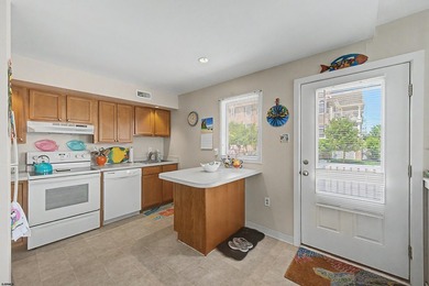 Great first floor corner unit in an ideal location! Enjoy the - photo 3