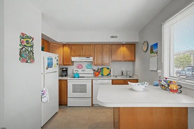 Great first floor corner unit in an ideal location! Enjoy the - photo 4