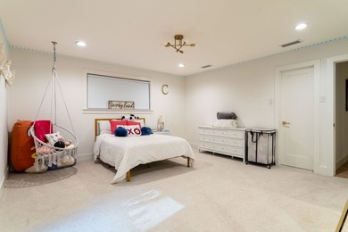 Substantially renovated in 2023, this stunning residence offers - photo 22