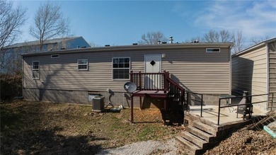 This charming 1,350 sq ft manufactured home sits on a permanent - photo 2
