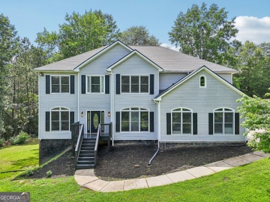 Lake Home For Sale in Hoschton, Georgia