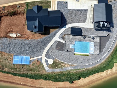 Cherokee Bay is a steadily growing Planned Unit Development that - photo 7