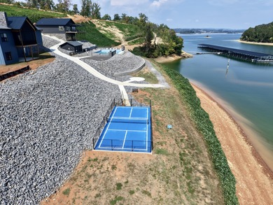 Cherokee Bay is a steadily growing Planned Unit Development that - photo 9