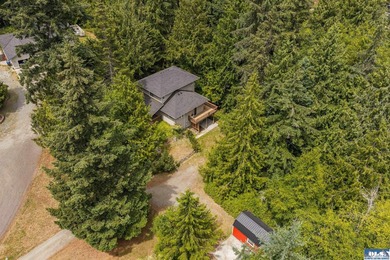 Amongst the trees on an acre this lovely 4 bed 2.5 bath home is - photo 11