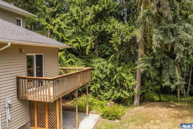 Amongst the trees on an acre this lovely 4 bed 2.5 bath home is - photo 15