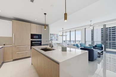 Upon entering this 15th floor residence you are greeted with - photo 6