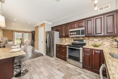 Exceptional first-floor 2-bedroom, 1-bath condo offering one of - photo 5