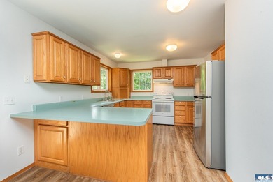 Amongst the trees on an acre this lovely 4 bed 2.5 bath home is - photo 29