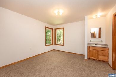 Amongst the trees on an acre this lovely 4 bed 2.5 bath home is - photo 36