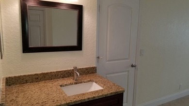 This updated ground floor unit features closed in porch; - photo 13