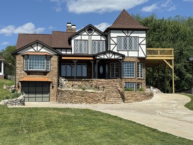 Enjoy a year-round lake view in the home you've been waiting - photo 5