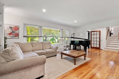 Nestled on a quiet, tree-lined block in the heart of Woodmere - photo 6