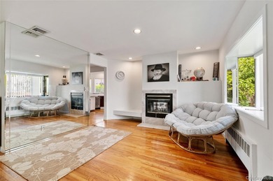 Nestled on a quiet, tree-lined block in the heart of Woodmere - photo 8