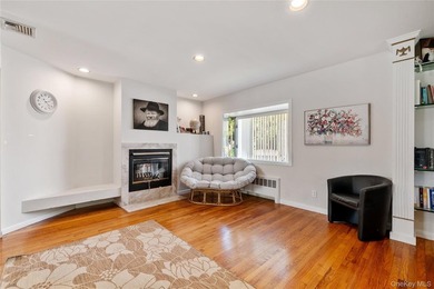 Nestled on a quiet, tree-lined block in the heart of Woodmere - photo 9