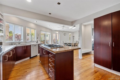 Nestled on a quiet, tree-lined block in the heart of Woodmere - photo 10