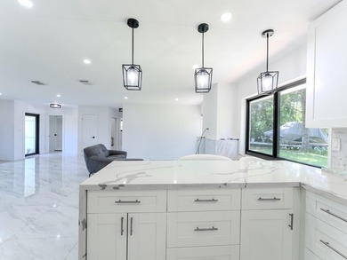 Welcome to this spacious 3-bedroom, 2-bathroom home situated on - photo 14