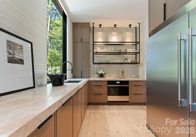 Private by design. Defined by the lake. Behind private gates and - photo 15