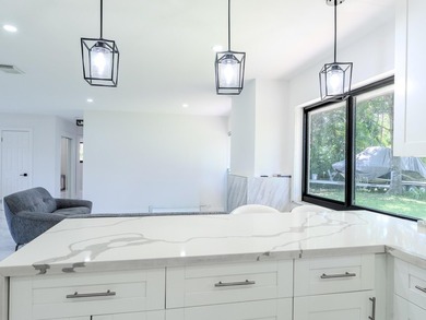 Welcome to this spacious 3-bedroom, 2-bathroom home situated on - photo 15
