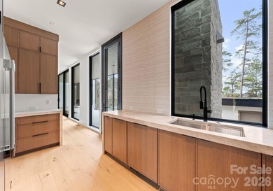 Private by design. Defined by the lake. Behind private gates and - photo 16