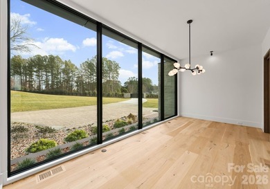 Private by design. Defined by the lake. Behind private gates and - photo 18