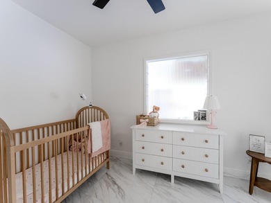Welcome to this spacious 3-bedroom, 2-bathroom home situated on - photo 19