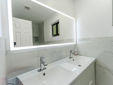 Welcome to this spacious 3-bedroom, 2-bathroom home situated on - photo 22