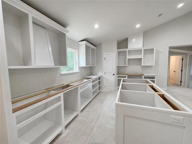 New construction on a wooded 0.65-acre lot in Lakewood Shores at - photo 3