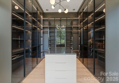 Private by design. Defined by the lake. Behind private gates and - photo 23