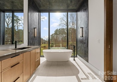 Private by design. Defined by the lake. Behind private gates and - photo 24