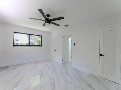 Welcome to this spacious 3-bedroom, 2-bathroom home situated on - photo 26