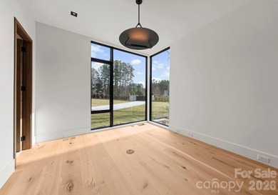 Private by design. Defined by the lake. Behind private gates and - photo 27