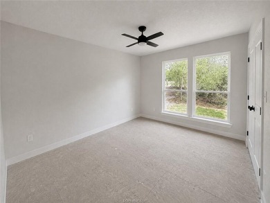 New construction on a wooded 0.65-acre lot in Lakewood Shores at - photo 9