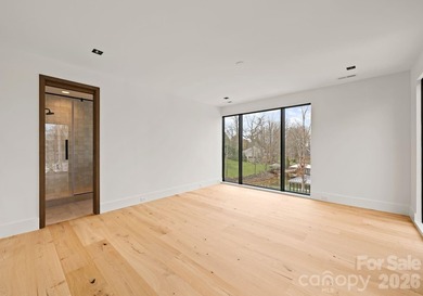 Private by design. Defined by the lake. Behind private gates and - photo 31