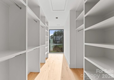 Private by design. Defined by the lake. Behind private gates and - photo 33