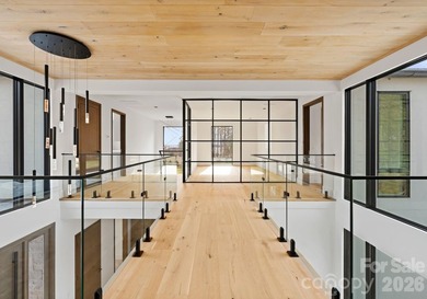 Private by design. Defined by the lake. Behind private gates and - photo 34