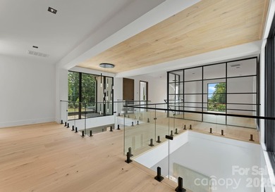 Private by design. Defined by the lake. Behind private gates and - photo 35