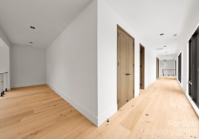 Private by design. Defined by the lake. Behind private gates and - photo 36