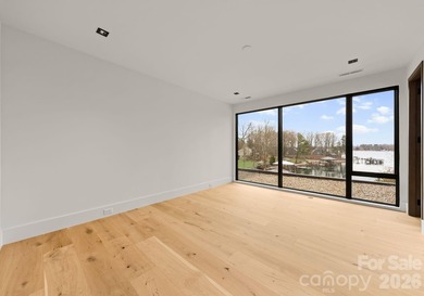 Private by design. Defined by the lake. Behind private gates and - photo 38