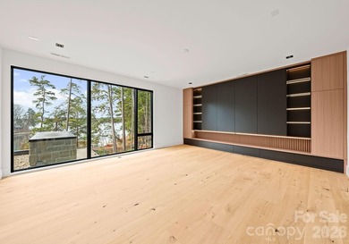 Private by design. Defined by the lake. Behind private gates and - photo 40