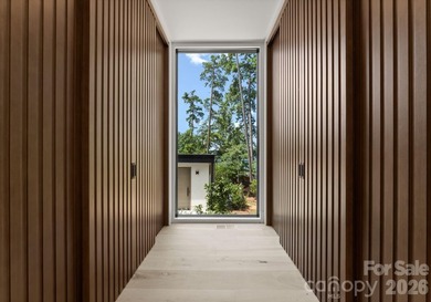 Private by design. Defined by the lake. Behind private gates and - photo 43