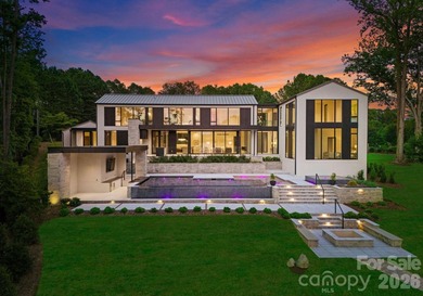 Private by design. Defined by the lake. Behind private gates and - photo 45