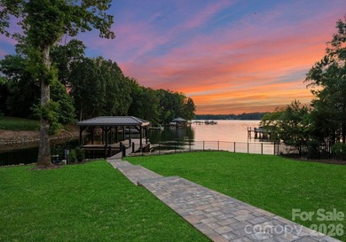Private by design. Defined by the lake. Behind private gates and - photo 47