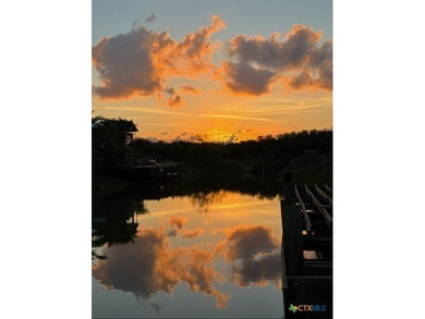 Canal-front turnkey coastal retreat with private fishing dock - photo 2