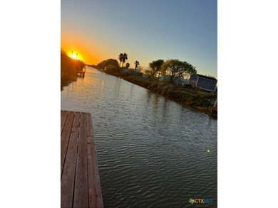 Canal-front turnkey coastal retreat with private fishing dock - photo 3