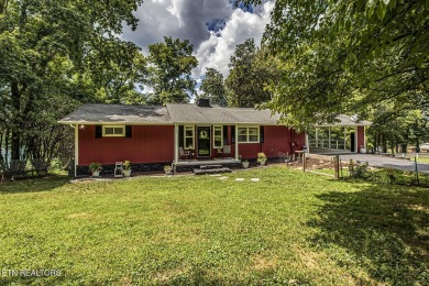 First-time on the market, this waterfront family home has been - Lake Home For Sale in Harriman, Tennessee