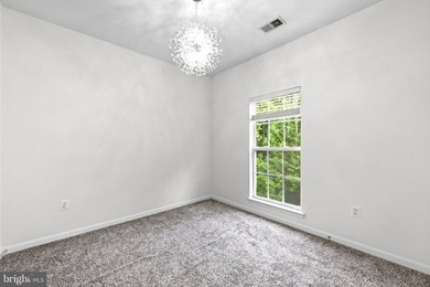 Stunning top-floor 2BR condo with elevator access and serene - photo 24