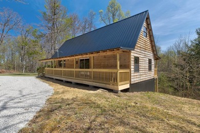 Tucked away among the trees and just minutes from Cave Run Lake - photo 5
