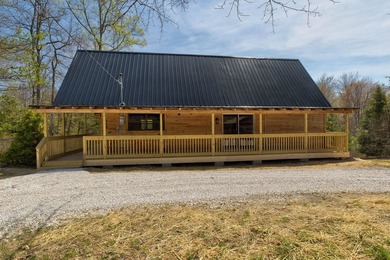 Tucked away among the trees and just minutes from Cave Run Lake - photo 6